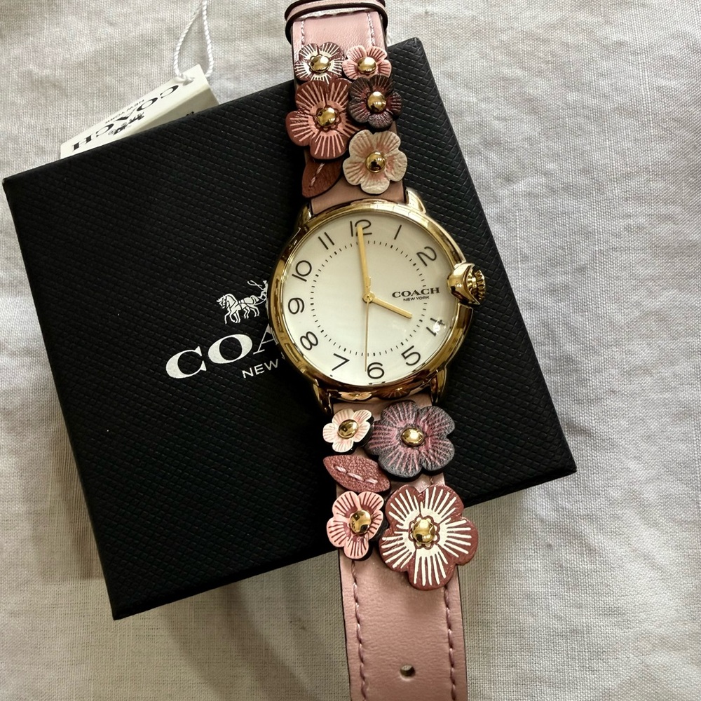 Coach Watch in Rose color with Tea Rose Appliqué  NWT
SOLD OUT very hard to find